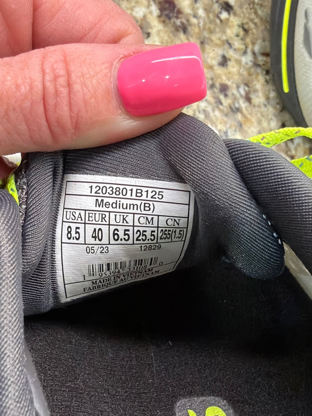 Brooks gray running shoes with neon yellow accents - Picture 2 of 6